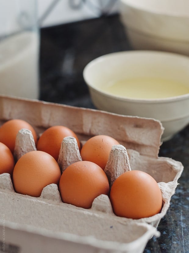 An open carton of eggs.