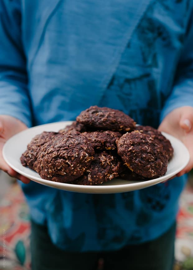 Holding a plate of Oatmeal Chocolate Cookies.