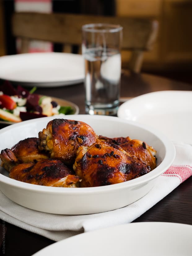 A large serving dish filled with Honey Spice Marinated Grilled Chicken.