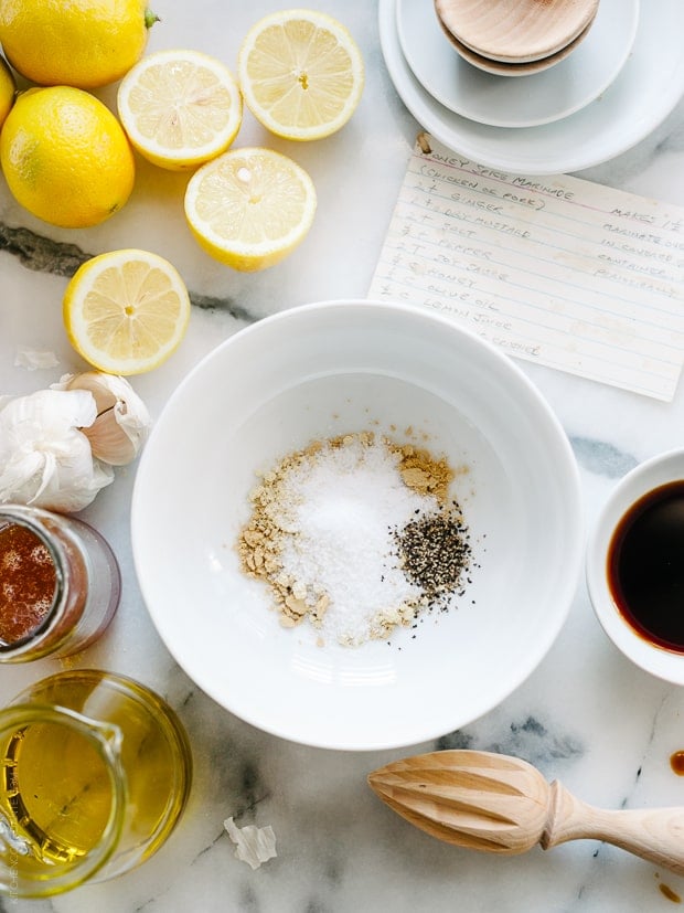 Mixing together ingredients for Honey Spice Marinated Grilled Chicken.