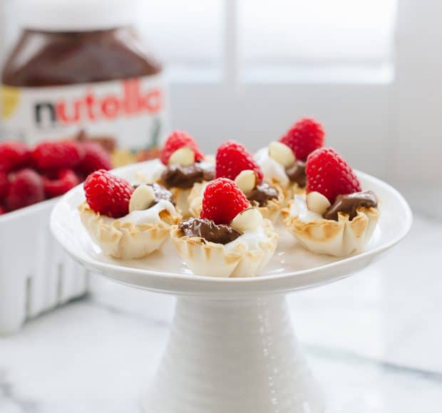 Nutella Greek Yogurt Phyllo Cups on a cake stand.