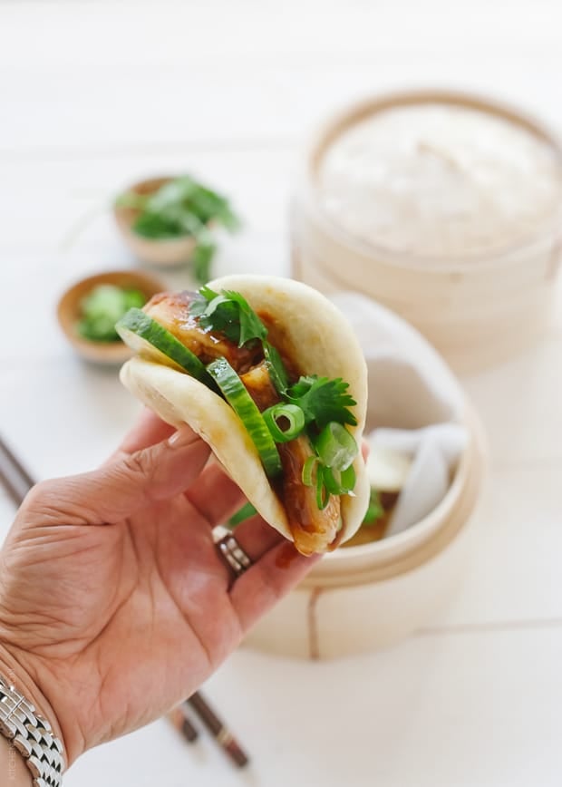 Holding a Pork Belly Bun (Gua Bao).