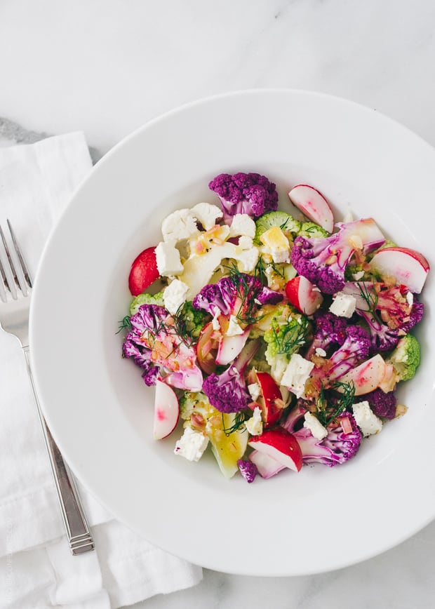 Tri-Color Cauliflower Salad in a white bowl.