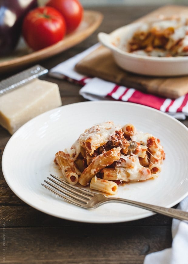 A serving of Baked Ziti with Roasted Eggplant on a white plate.