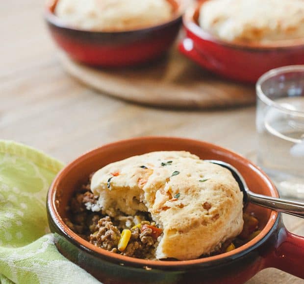 Buttermilk-Gruyere Biscuit Topped Shepherd's Pie in a small handled dish.