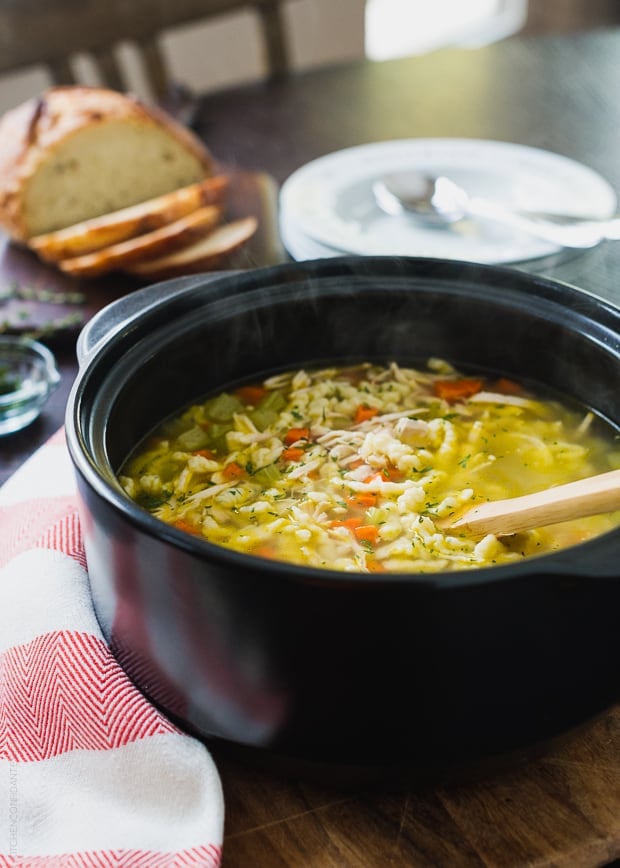 A large pot of chicken soup with homemade spaetzle.