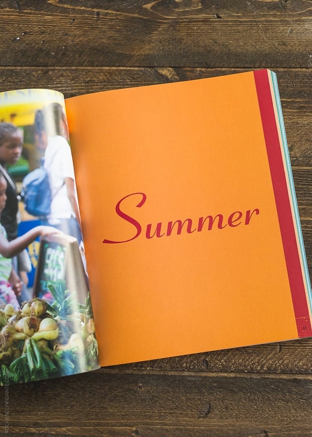 Open pages of The New Greenmarket Cookbook on a wooden surface.