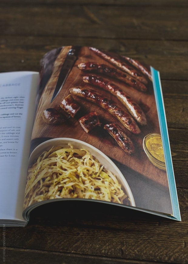 Open pages of The New Greenmarket Cookbook on a wooden surface.