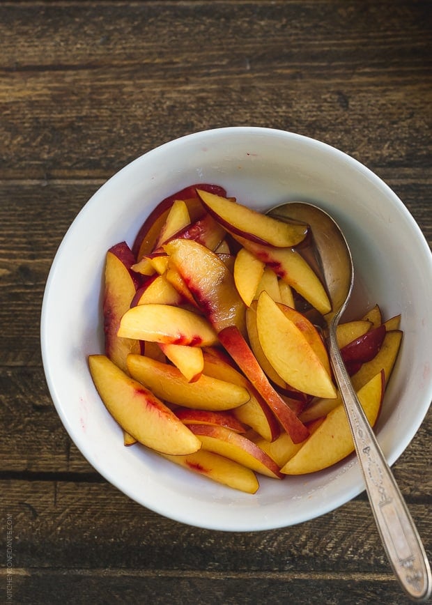 A bowl of sliced nectarines. 