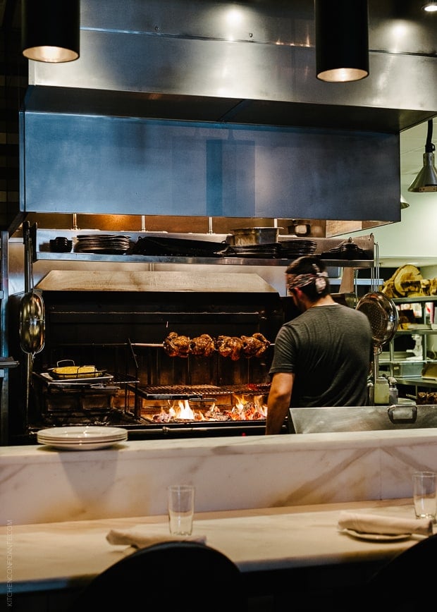 Kitchen at Imperial - chef cooks over a large grill.