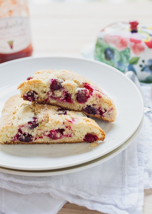 Two Make-Ahead Cranberry Scones on a white plate.