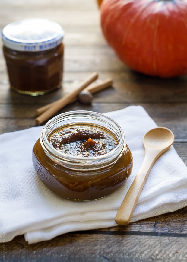 A glass jar of homemade maple pumpkin butter.