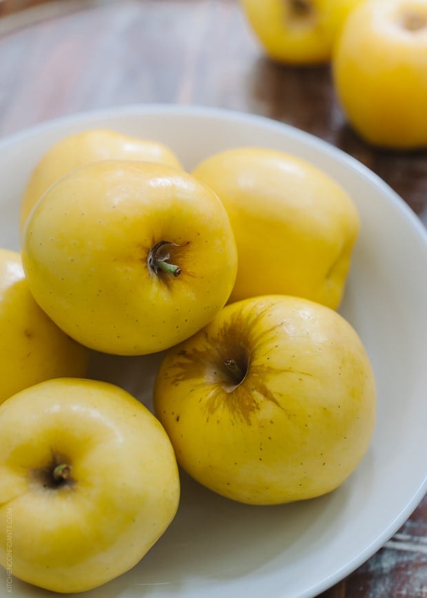 A bowl of yellow Opal apples.