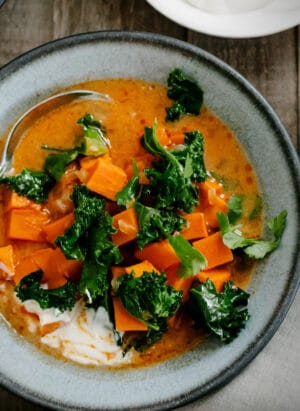 Sweet Potato and Kale Coconut Curry Soup | www.kitchenconfidante.com