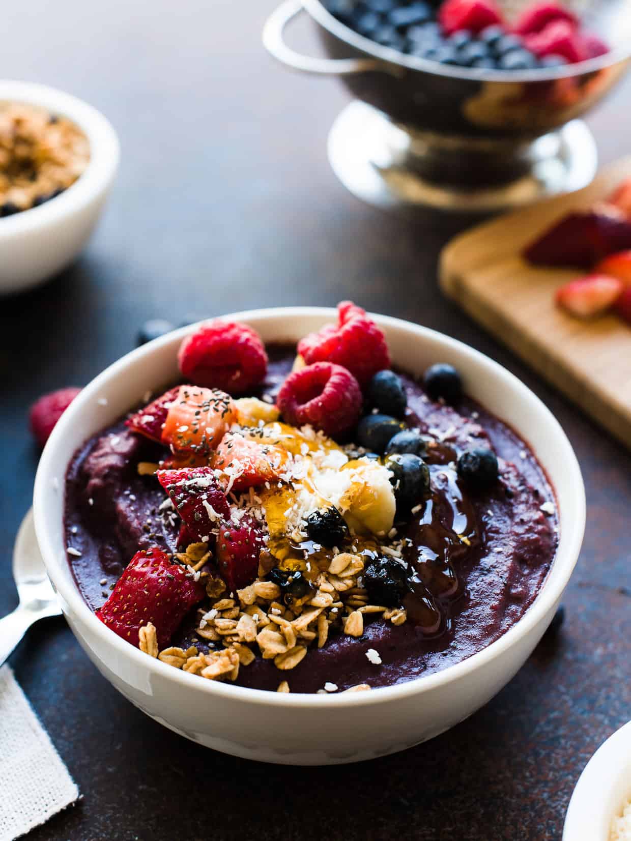 Acai Berry Bowl topped with berries, granola, coconut and honey.