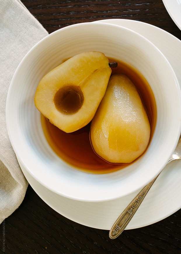 Tea Poached Pears in a white bowl.