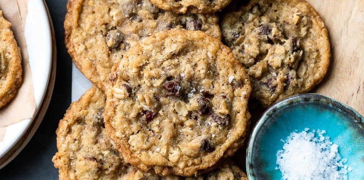 A selection of Chocolate Chip Cranberry Oat Cookies arranged on serving board.