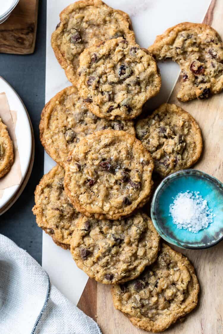 A selection of Chocolate Chip Cranberry Oat Cookies arranged on serving board.