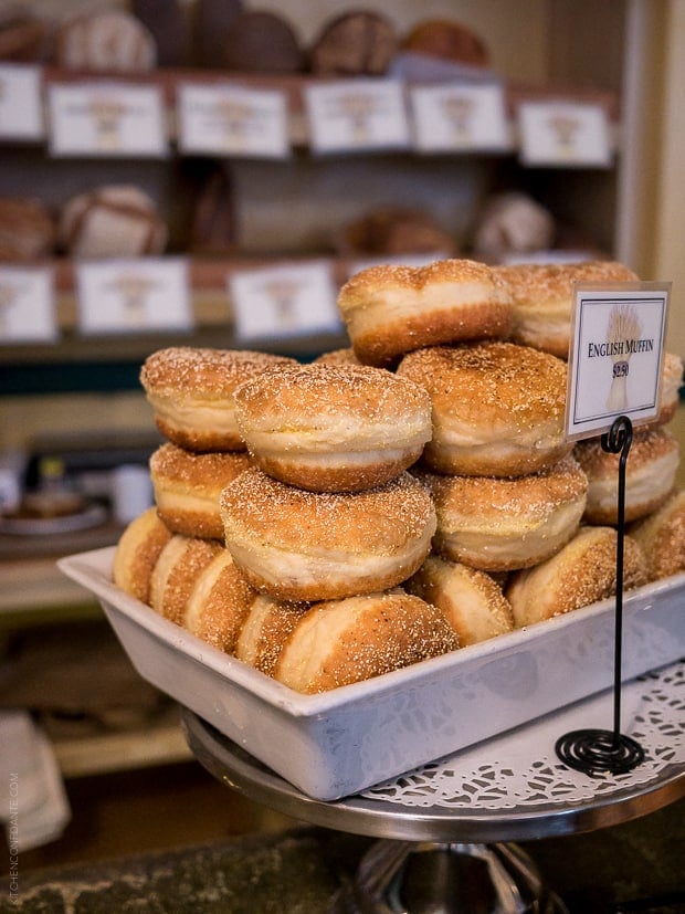 English Muffins displayed in a bakery.