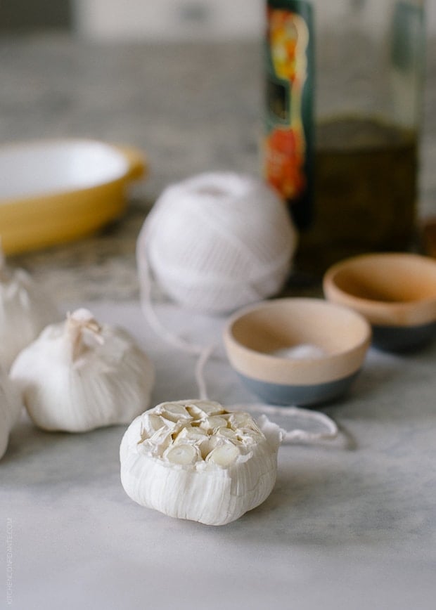 A head of garlic prepared for roasting.