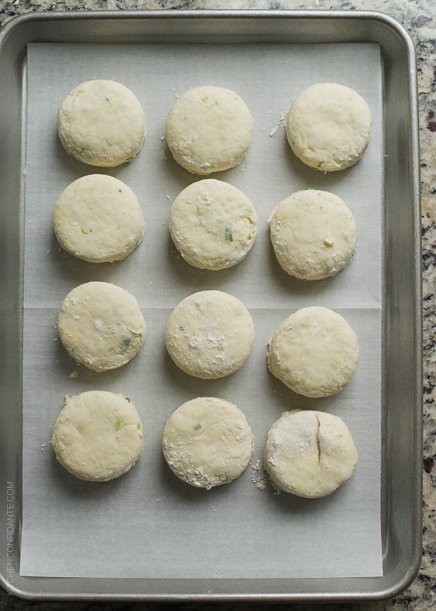 Ready-to-bake biscuits on a baking tray.