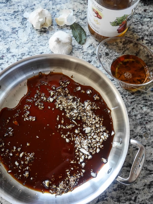 Soy sauce and garlic in a large pan. 