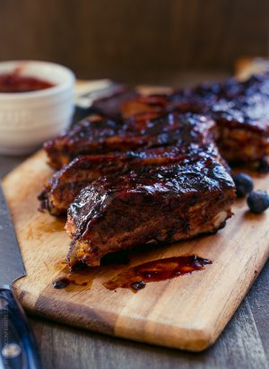 Baby Back Ribs glazed with Blueberry Balsamic Barbecue Sauce.