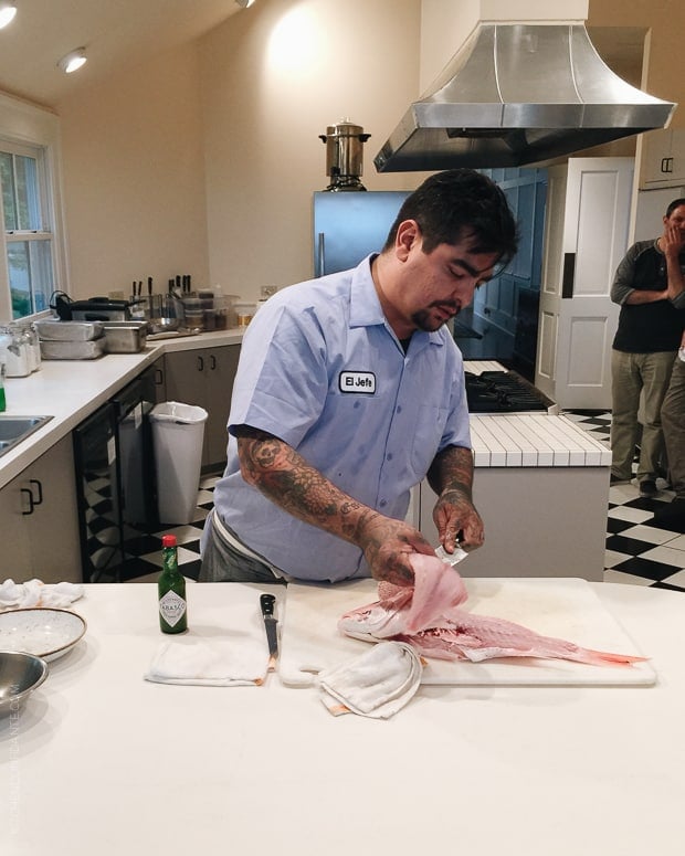 Chef Aaron Sanchez Demo preparing fish.