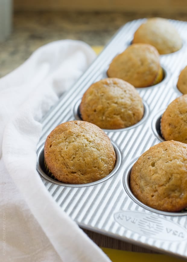 Banana Nut Ricotta Muffins in a muffin tin.