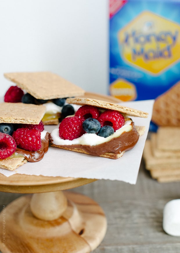 Coconut Jam Berry S'mores filled with marshmallows, milk chocolate, and plenty of berries.