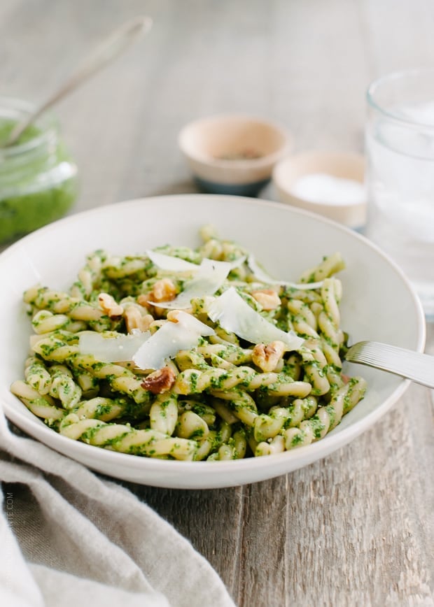 Swiss Chard Walnut Pesto Pasta in a white dish.