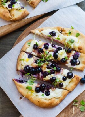 Blueberry, Feta and Honey-Caramelized Onion Naan Pizza | www.kitchenconfidante.com | A savory pizza that will surely surprise your tastebuds!