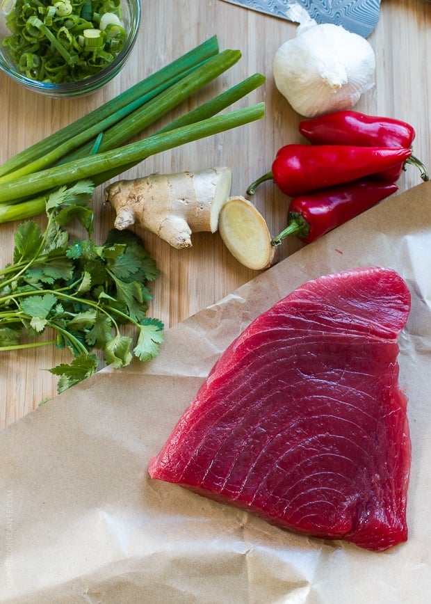 Fresh vegetables and ahi tuna ready for prep.