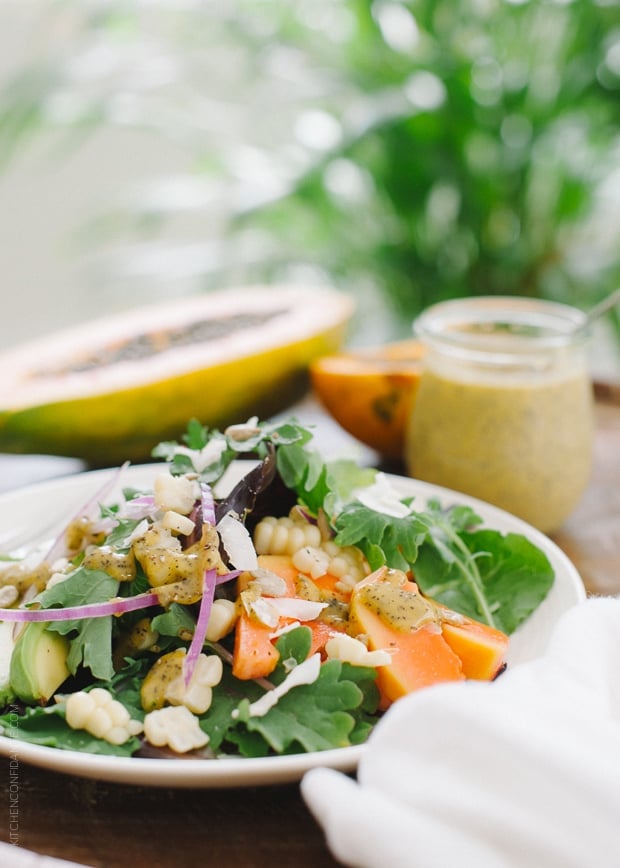 Papaya Seed Vinaigrette Dressing over a green salad.