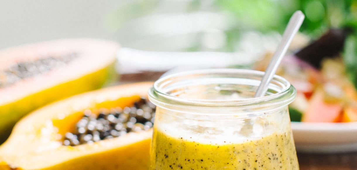 Papaya Seed Vinaigrette Dressing in a glass jar.