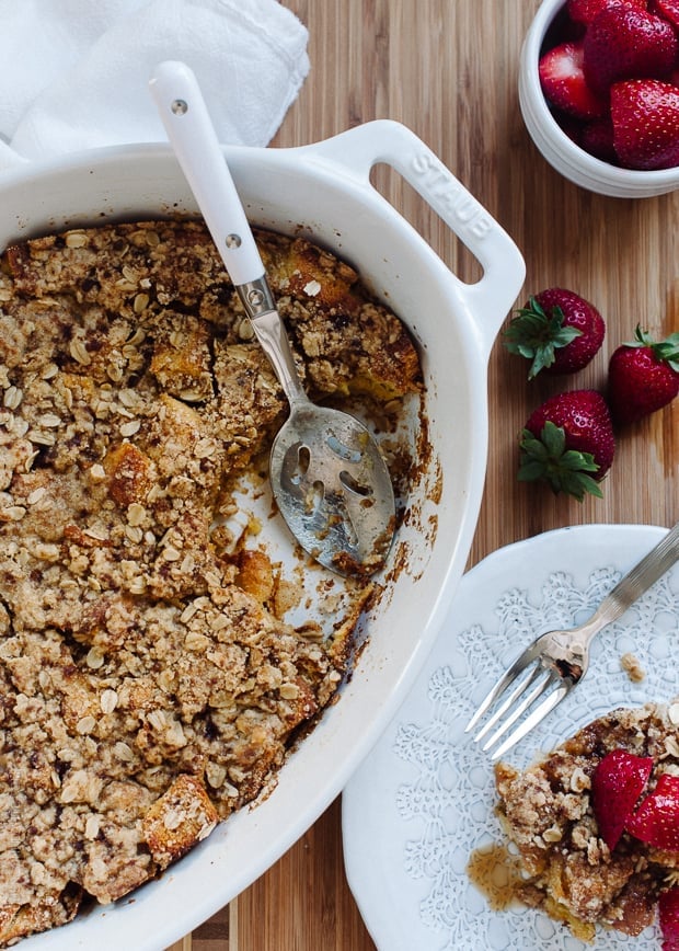 Baked Buttermilk French Toast with Oat Streusel in a white Staub casserole dish.