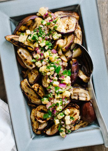 Grilled Eggplant with Corn Chimichurri in a serving dish.