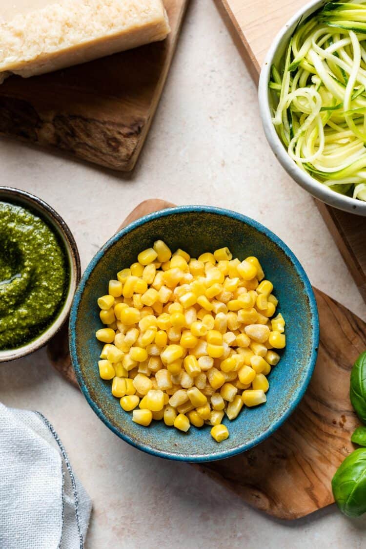 Corn kernels in a bowl for Zucchini, Corn and Pesto Flatbreads.