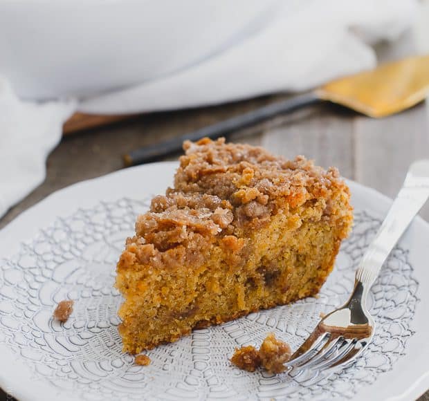 Slice of Buttered Rum and Candied Sweet Potato Crumb Cake from the Grandbaby Cakes cookbook on a white plate.