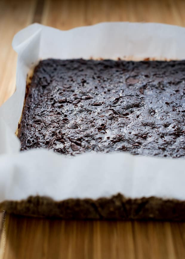 Zucchini Banana Brownies before slicing on a cutting board.