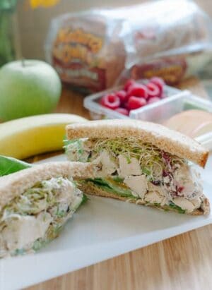 Green Apple Chicken Salad (Mayo Free) filling a sandwich.