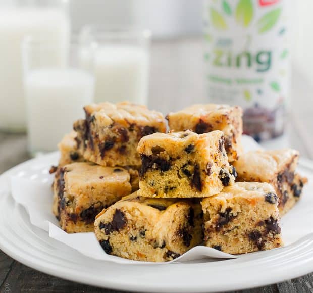 A stack of Sweet Potato Blondie Bars on a white plate.