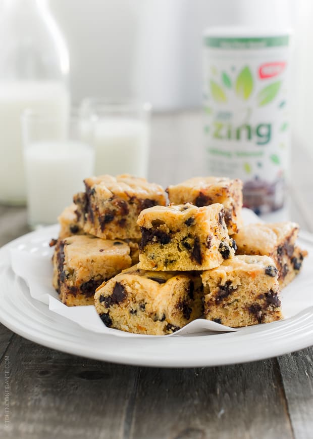 A stack of Sweet Potato Blondie Bars on a white plate.