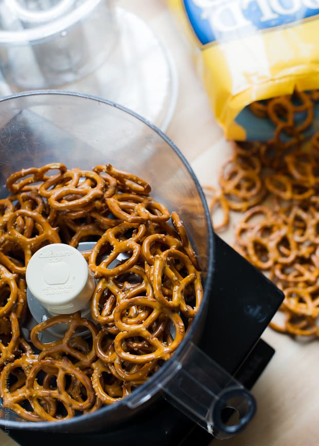 Pretzels added to a food processor.