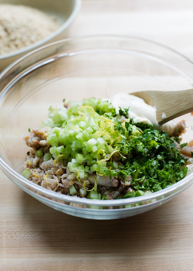 Mixing together ingredients for Pretzel Crusted Crab Cake Sliders.