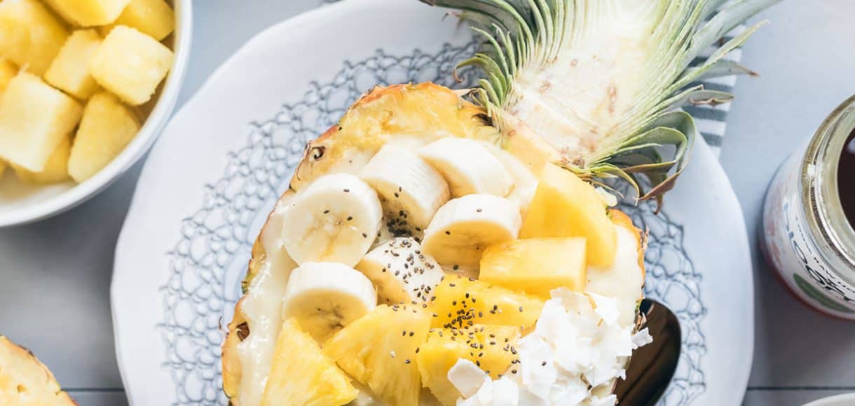 Pineapple Smoothie Bowl served in a pineapple.