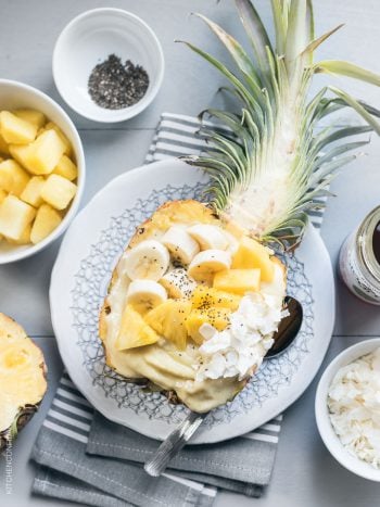 Pineapple Smoothie Bowl served in a pineapple.