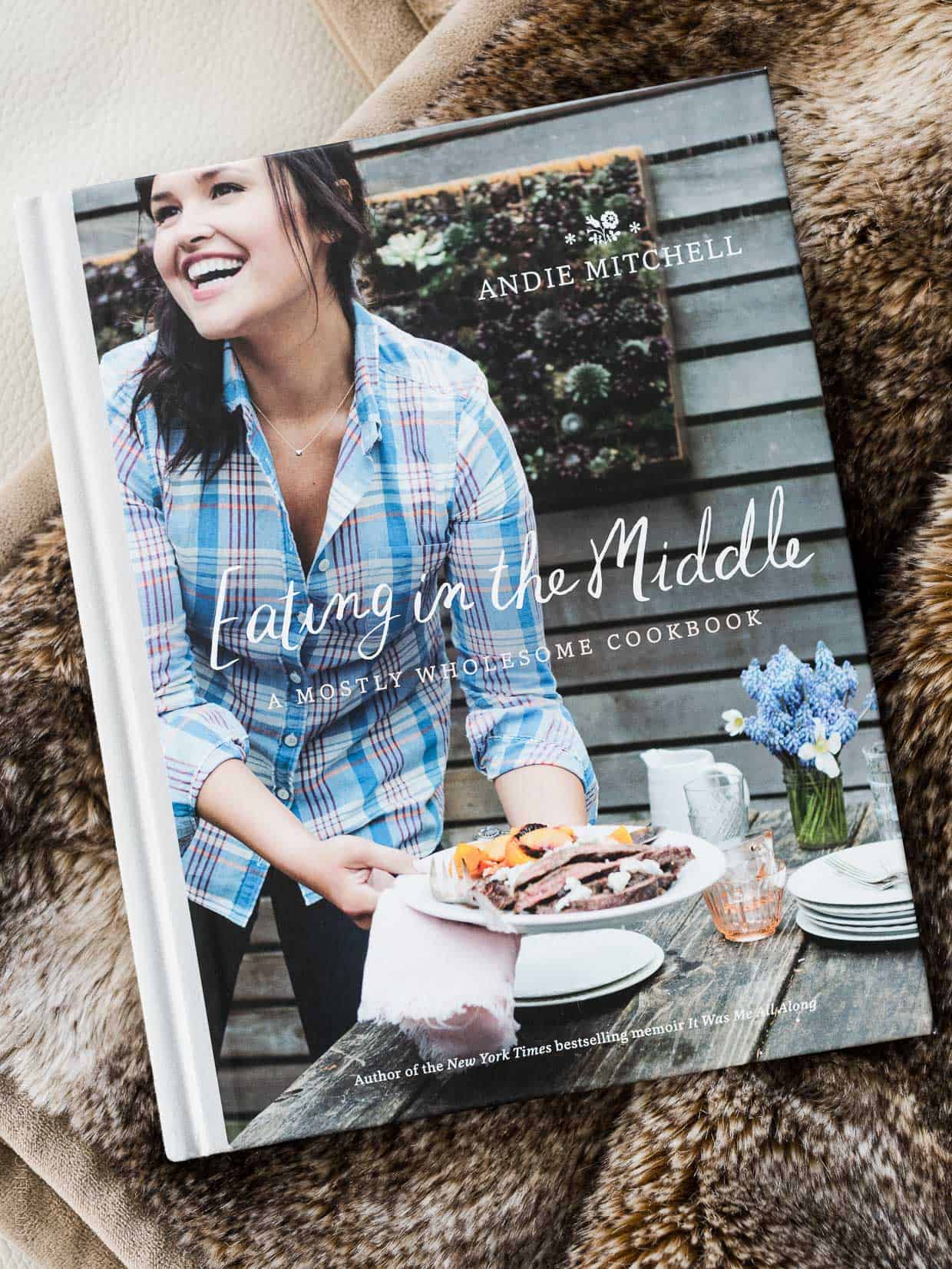 The book cover of Andie Mitchell's cookbook, Eating in the Middle.