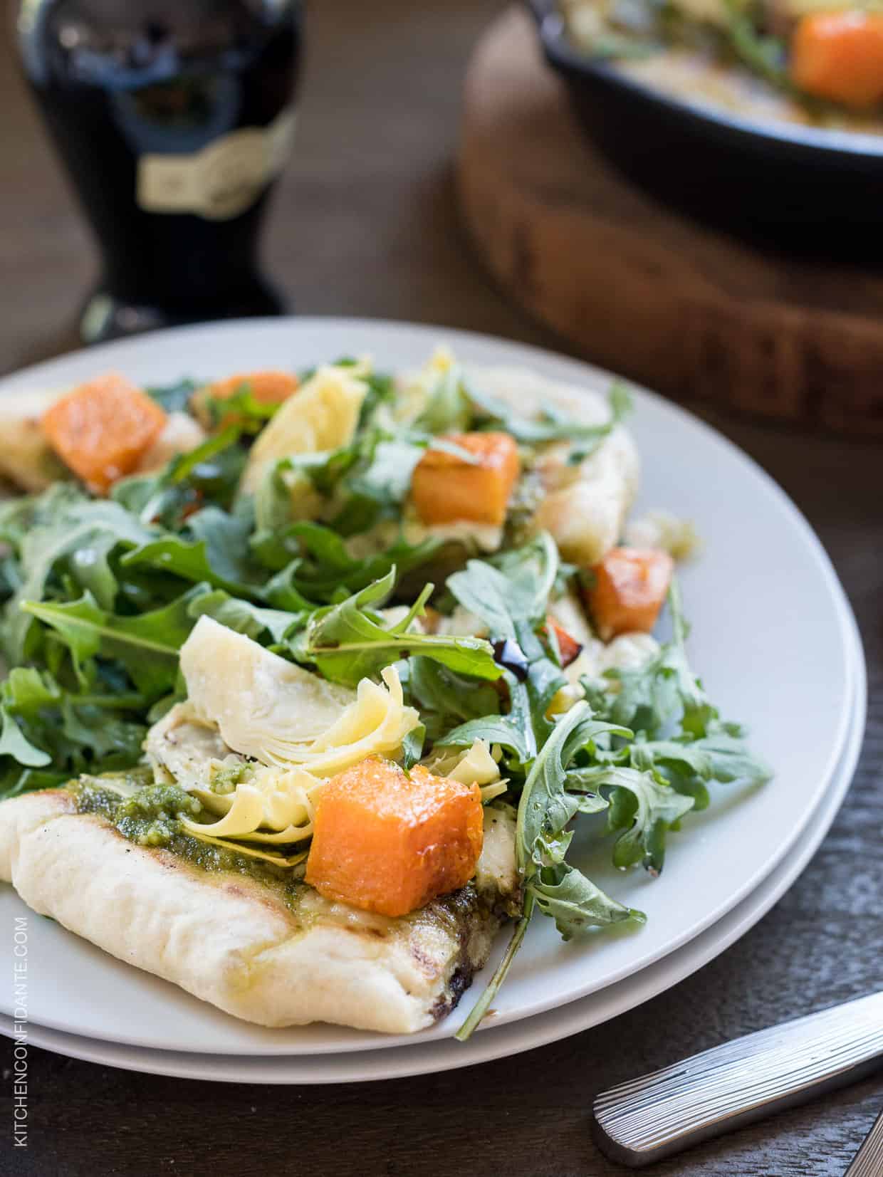 Butternut Squash, Goat Cheese and Artichokes on a Skillet Pesto Flatbread.