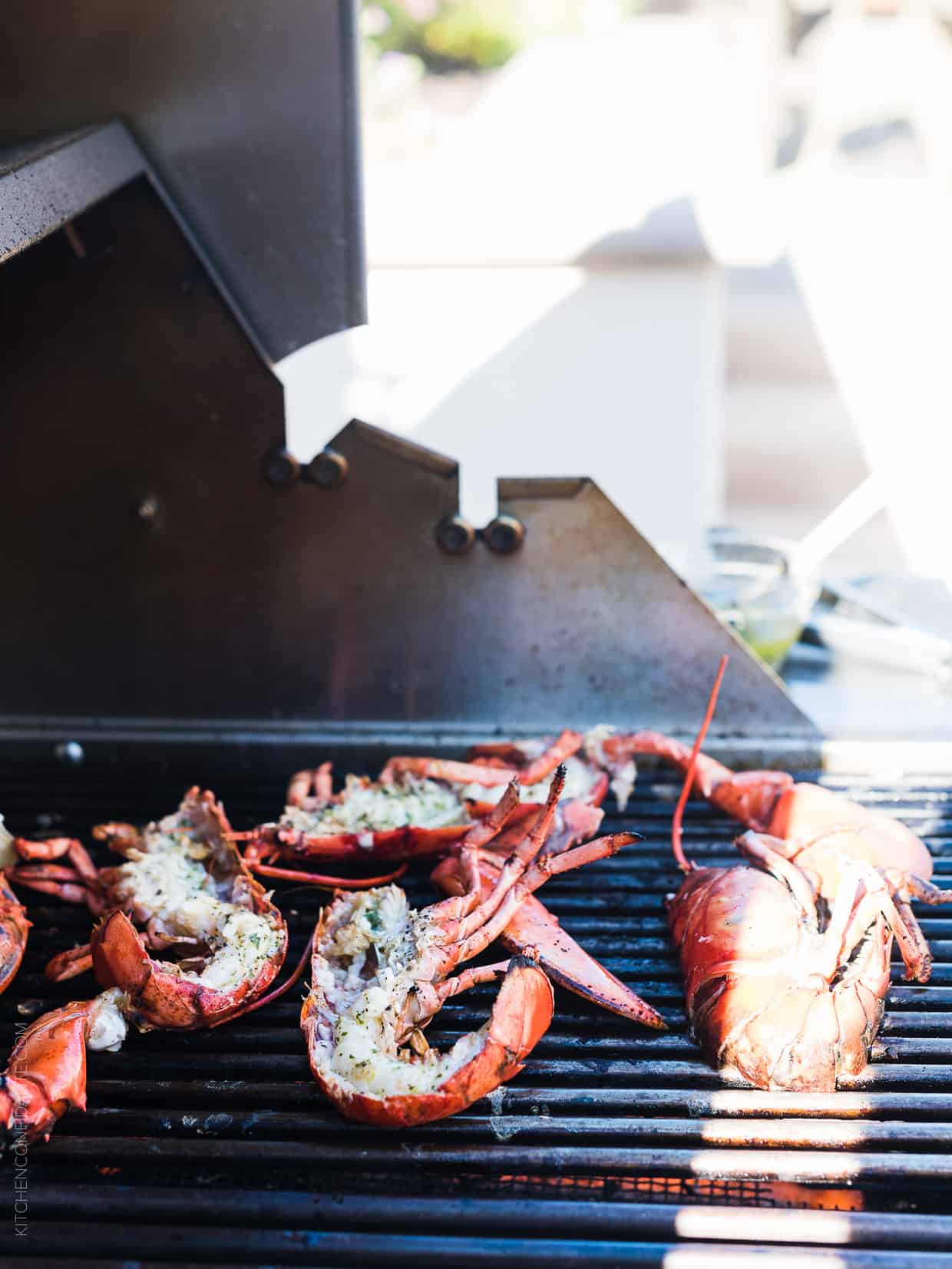 Grilled Chimichurri Lobster and Chimichurri Potato Salad is the easiest feast to come off the grill! A simple chimichurri made with good olive oil and red wine vinegar adds zing to grilled lobster and an herbed potato salad. Try it for your next barbecue!